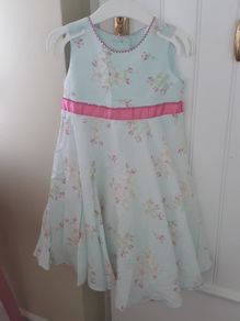 Beautiful summer dress and short sleeved cardigan.