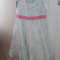 Beautiful summer dress and short sleeved cardigan.