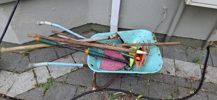 Kids gardening tools and wheelbarrow
