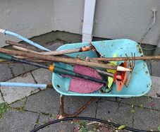 Kids gardening tools and wheelbarrow