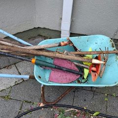 Kids gardening tools and wheelbarrow