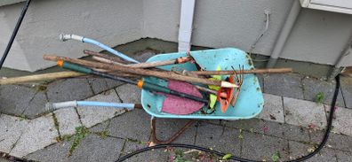 Kids gardening tools and wheelbarrow
