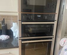 Neff integrated double oven and microwave