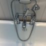 Roll top cast iron bath with taps Image 3