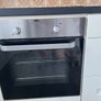 Kitchen including integrated dishwasher and cooker Image 4