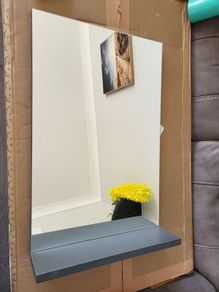 Mirror with shelf