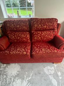 Red and gold 2 seater reversible print sofa