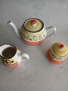 Teapot sugar bowl and milk jug