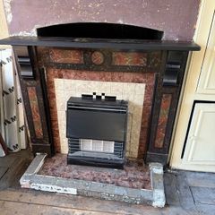 Vintage stone fireplace mantle