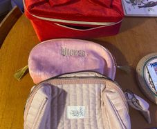 Wicked and Estee Lauder Make Up Bags