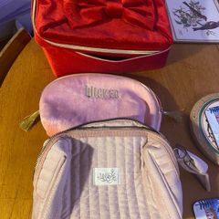 Wicked and Estee Lauder Make Up Bags