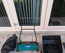 Bosch AHM 38 G Manual Lawn Mower with blade sharpener and cover