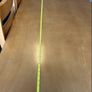 Solid wood dining table. Damage on corner as shown in photos. Image 9