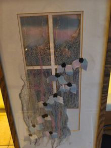 Lovely framed pictuer of modern art A print with added wool and flower's not signed.