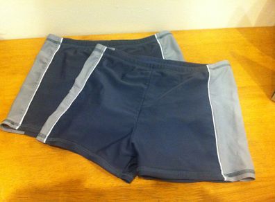 Two pairs of Boys swimming trunks, aged 9-10 years.