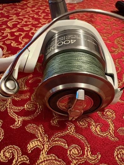 shimano stradic 4000 with spare spool and spiderwire braid
