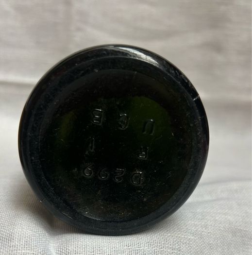 Antique Cork Advertising Bottles x2