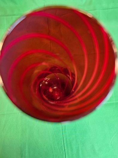 Elegant Murano-style vase made of art glass in ruby red with white spiral stripes