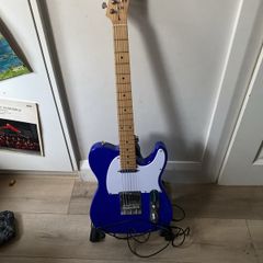 Electric guitar with stand