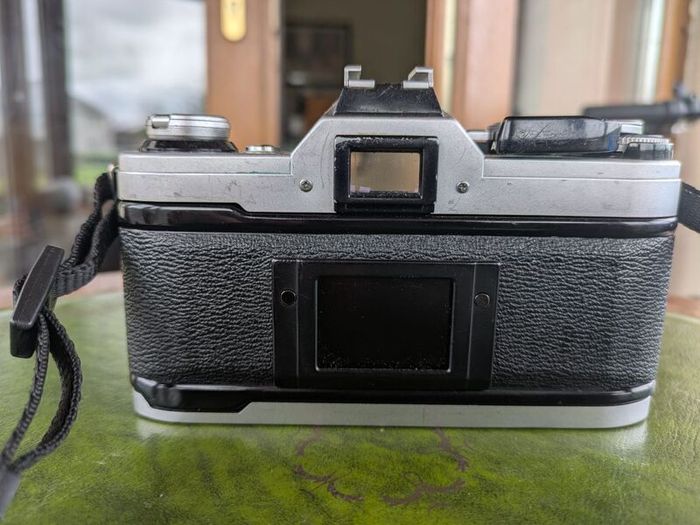Canon AE-1 + FD 50mm f/1.8 + Tokina 28mm f/2.8