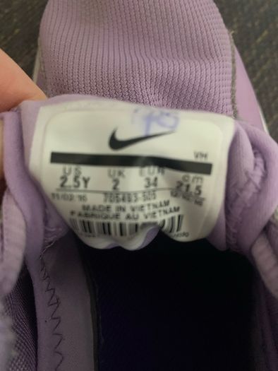 Purple Nike Tanjun Runners