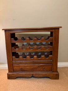 Mahogany wine rack with storage drawer