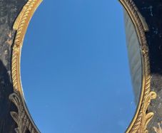 Retro vintage petit metal framed wall mirror c1960