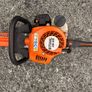 STIHL HS 45 petrol hedge trimmer with 24-inch double-sided cutting blade. Image 6