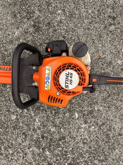 STIHL HS 45 petrol hedge trimmer with 24-inch double-sided cutting blade.