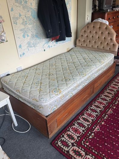 Wooden single bed with drawers