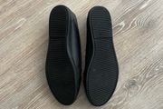 Flat slip on black women's casual shoes