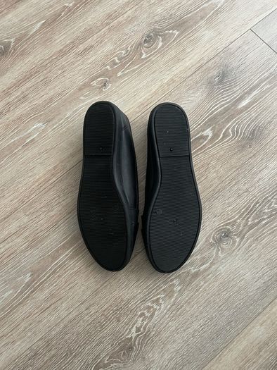 Flat slip on black women's casual shoes