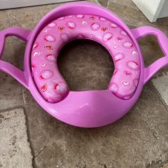 Potty and toilet seat
