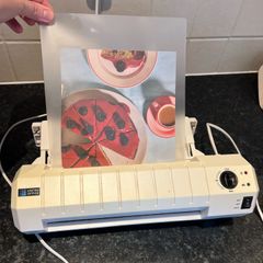 Laminator with laminating pouches
