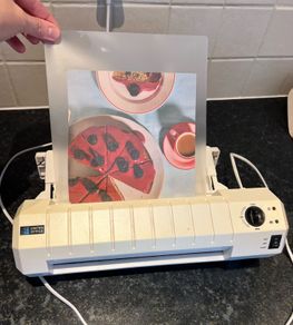 Laminator with laminating pouches