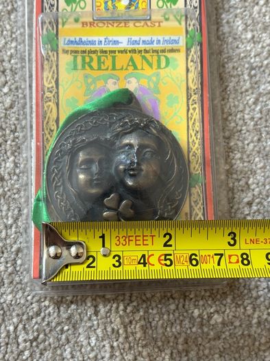 cold-cast bronze hanging medallion or ornament titled "Mother", handmade in Ireland