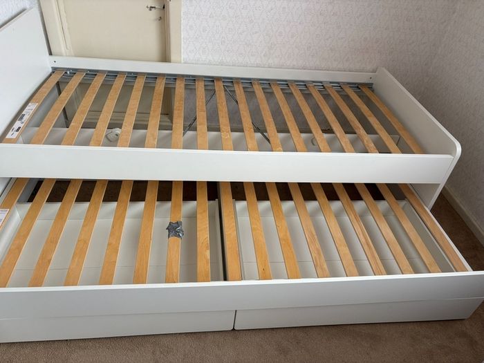 single bed with storage and pull out bed.