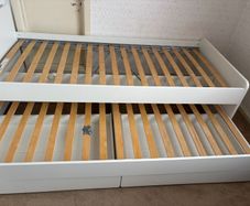 single bed with storage and pull out bed.