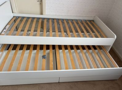 single bed with storage and pull out bed.