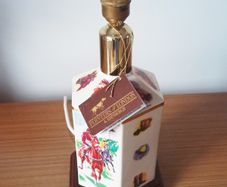 Vintage "Pointers of London & Edinburgh" porcelain  table lamp with wooden base and horse racing theme  height 30cm
