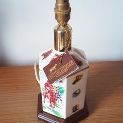 Vintage "Pointers of London & Edinburgh" porcelain  table lamp with wooden base and horse racing theme  height 30cm