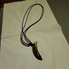 Wild boar tusk necklace
