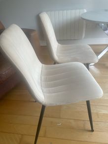 2 cream chairs
