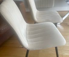 2 cream chairs