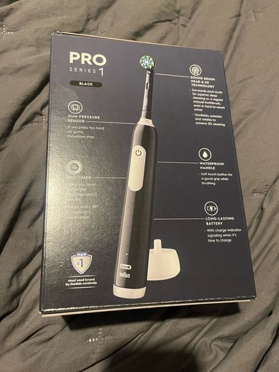 Oral b pro 1 braun electric toothbrush with travel case