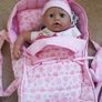 Doll, Carrycot, quilt and clothes Image 4