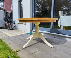 Solid round wood table