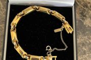 Gold tone monet bracelet