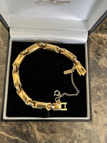 Gold tone monet bracelet