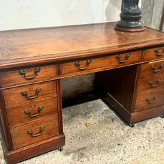 Vintage mahogany pedestal desk with leather top